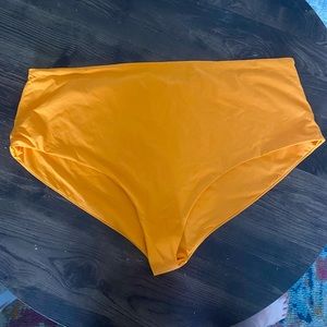 Girlfriend Collective orange swim bikini bottom